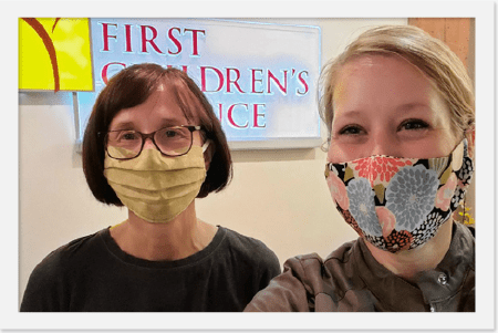 Laura Riley (L) of FCF and Kristi Jacobson (R) of ONB, pause for a selfie after ONB's office supply donation to FCF.