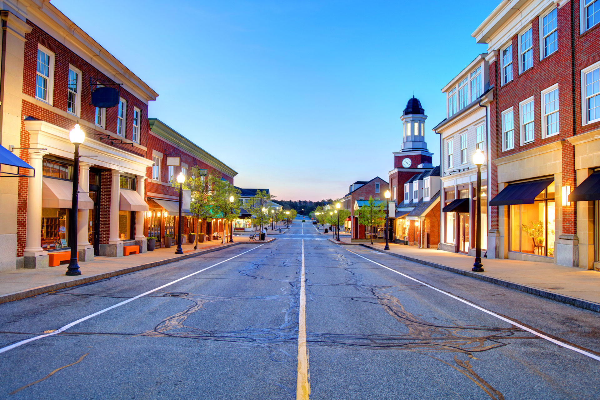 An empty street in downtown rural America at dusk.