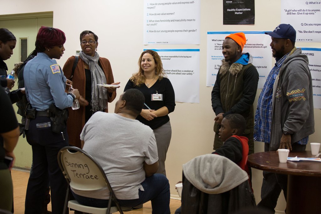 A diverse group of people gathered together to share viewpoints.