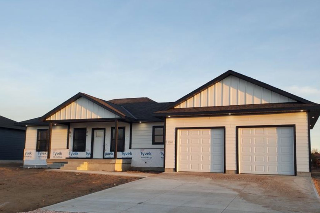 New home build. Exterior of the house is grey with black trim.